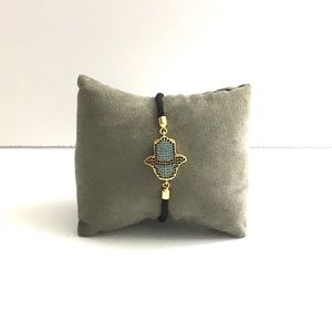 Adjustable Black String Bracelet with the Hamsa.